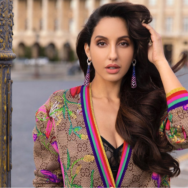 NORA FATEHI RAISES THE TEMPERATURE IN MULTICOLOURED GUCCI’s OVERCOAT